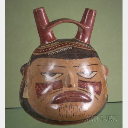 Pre-Columbian Polychrome Pottery Double-Trophy Head Stirrup Vessel