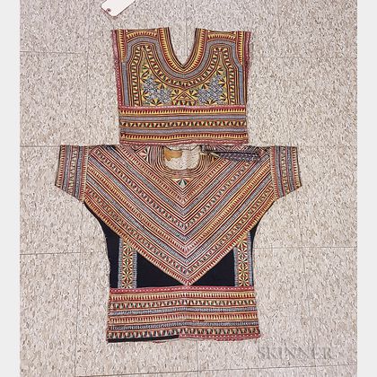 Two African Silk-embroidered Child's Shirts. Estimate $200-300