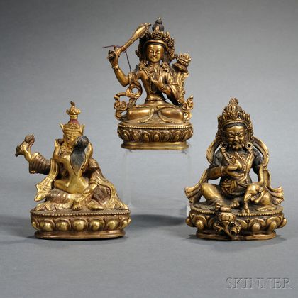 Three Small Gilt-bronze Seated Buddhist Figures