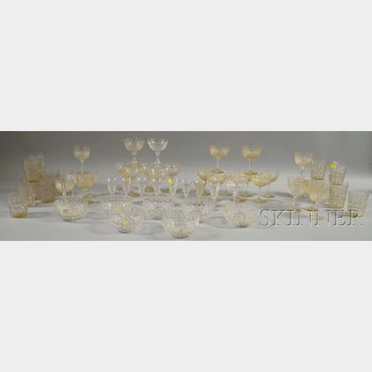 Sixty Pieces of Colorless Cut Crystal Glass and Stemware