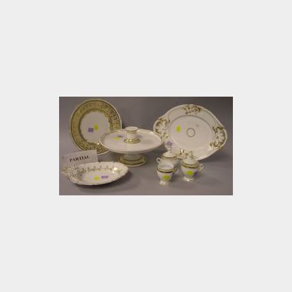 Set of Twelve Limoges Gilt Decorated Porcelain Dinner Plates and Eighteen Pieces of Gilt Decorated Porcelain Tableware. 