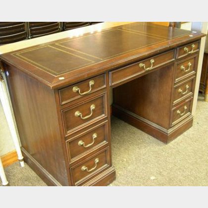 Sligh Furniture Georgian-style Leather Inset Walnut Veneer Flat-top Double Pedestal Desk. 