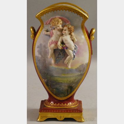 Paris Porcelain Gilt, Hand-painted Landscape-decorated, and Red-ground Mantel Vase with Cherubs in High Relief