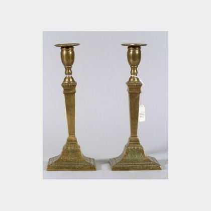 Pair of Engraved Bronze Candlesticks