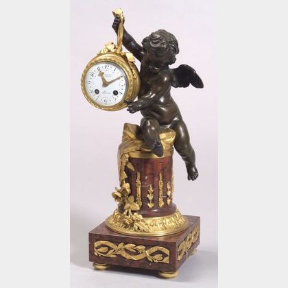 French Louis XVI-style Parcel Gilt Bronze and Rouge Marble Figural Mantel Clock