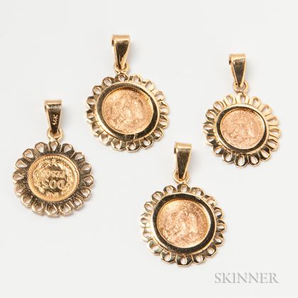 Four 14kt Gold-mounted Peso Pendants