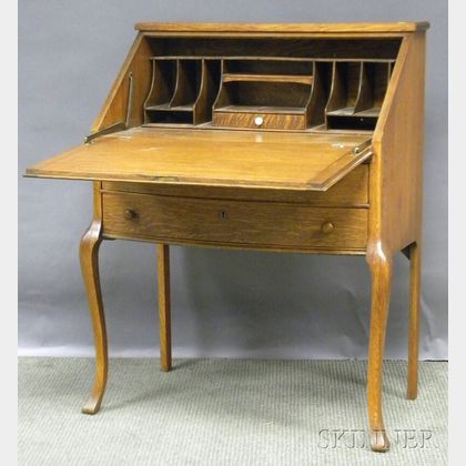 Early 20th Century Lady's Oak Slant-lid Bowfront Writing Desk