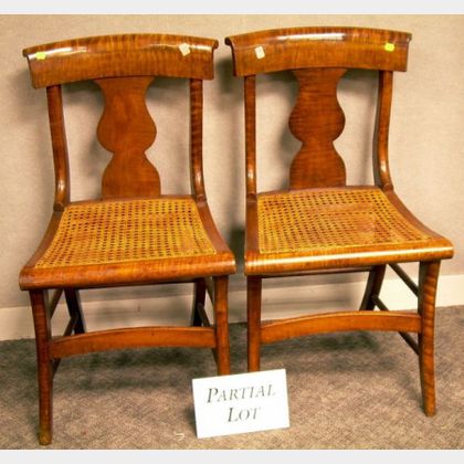 Four Classical Caned Tiger Maple Side Chairs. 