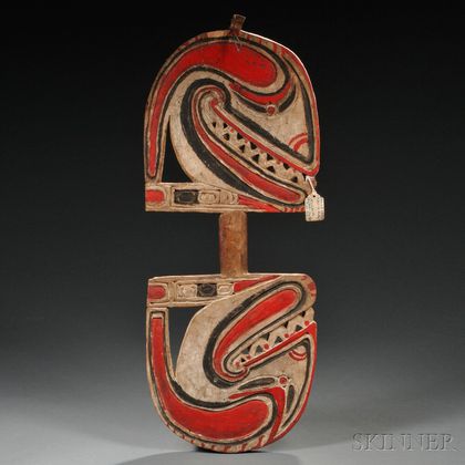 Sold at auction Trobriand Islands Carved and Painted Wood Dance Shield ...