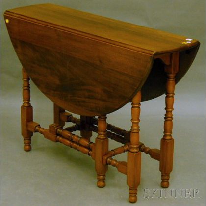 William & Mary-style Mahogany and Walnut Drop-leaf Gate-leg Table. Estimate $100-200