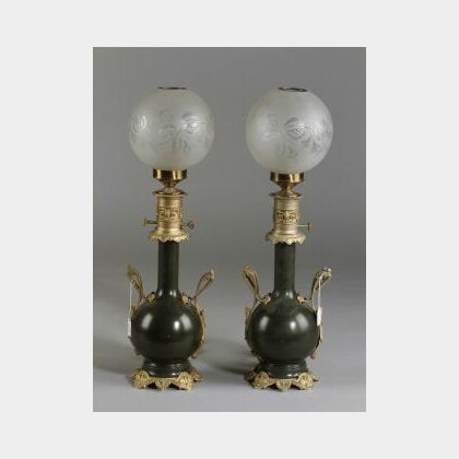 Pair of Aesthetic Movement Patinated Metal and Ormolu Mounted Argand Lamps