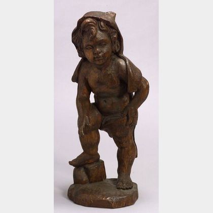 Continental Carved Fruitwood Figure of Putto