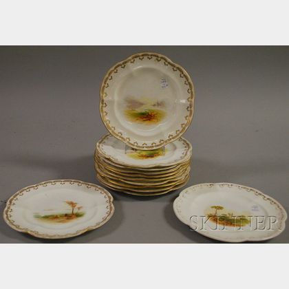 Set of Twelve Gilt and Hand-painted Landscape Decorated Porcelain Plates