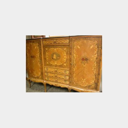 Louis XV/XVI Style Marquetry Inlaid Walnut Serpentine Wardrobe, center section with drawer over fall front writing surface and three st