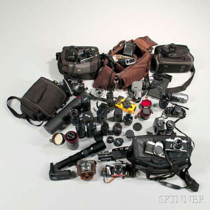 Large Group of Cameras and Lenses