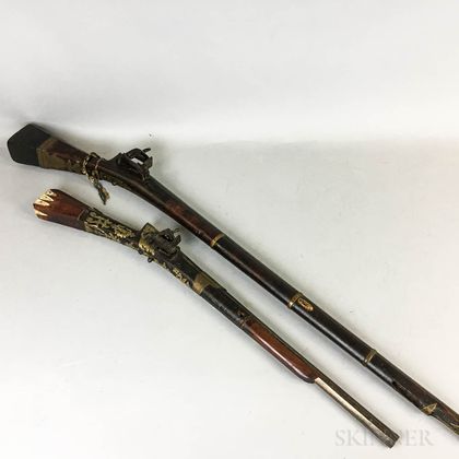Two Middle Eastern Brass-clad Muskets