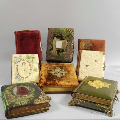 Fifteen Mostly Brass-mounted Victorian and Art Nouveau Photo Albums. Estimate $200-300