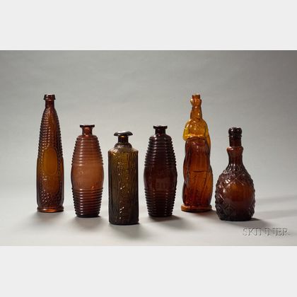 Six Colored Molded Glass Bottles