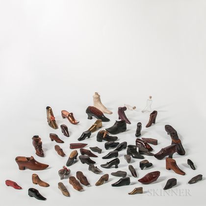 Collection of Approximately Fifty-two Shoe-form Snuffboxes and Pincushions