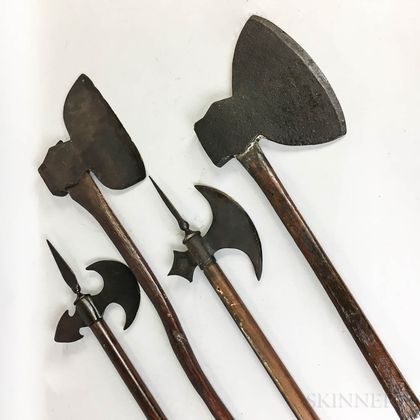 Four Wood and Iron Hand Axes. Estimate $100-150