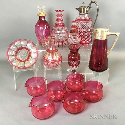 Fourteen Pieces of Cranberry and Cranberry Cut-to-clear Glass. Estimate $20-200
