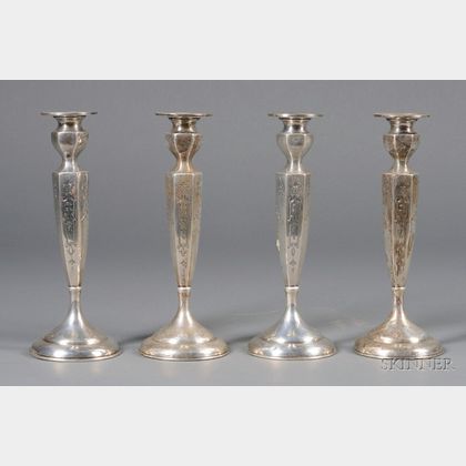 Set of Four American Weighted Sterling Candlesticks