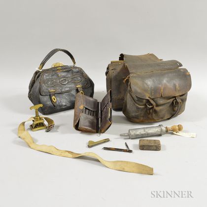 Leather Saddle Bag, Travel Set, an Embossed Leather Bag, and Other Miscellaneous Items. Estimate $100-150