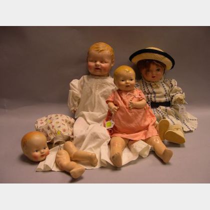 Four Composition Dolls