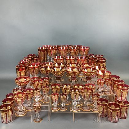 Sixty-eight Pieces of Gilt Cranberry Overlay Glass Stemware