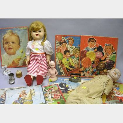 Seven Mid-20th Century Childrens Chromolithograph Puzzles, Two Dolls and Miscellaneous Toys and Articles. 