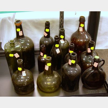 Thirteen Colored Free-blown Glass Bottles