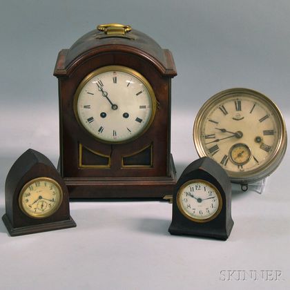 Group of Four Clocks