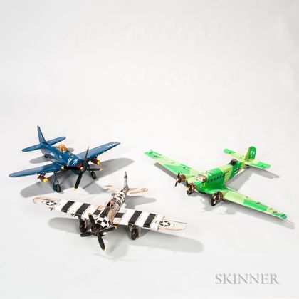 Two Remote-controlled WWII Fighter Planes and an Aviation Model