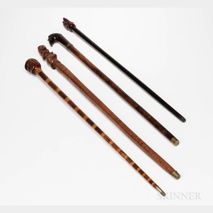 Four Carved Figural Canes