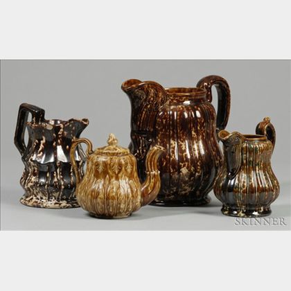 Three Pottery Pitchers and a Teapot