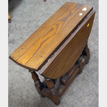 Diminutive William & Mary Style Oak Drop-leaf Gate-leg Table. 