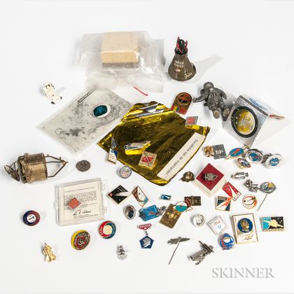 NASA Memorabilia Collection: Pins, Small Flown Material Sample, and Other Material.