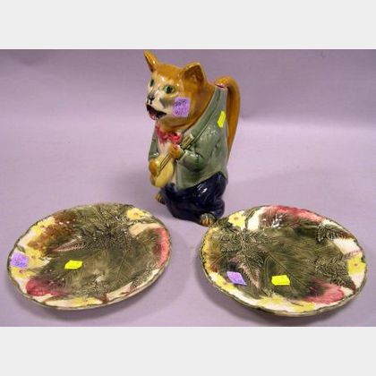 Pair of Majolica Leaf and Fern Decorated Plates and a Cat Toby Jug. 