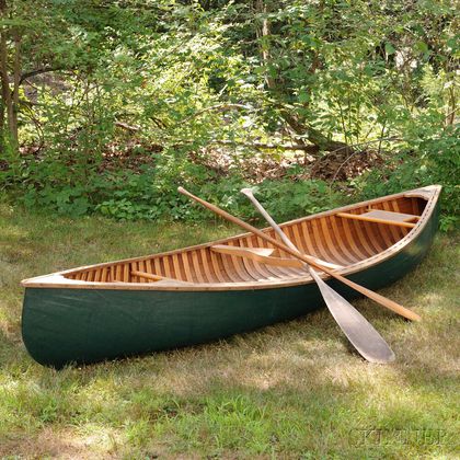 Arthur E. Levenseller 12-foot Canoe with Two Canoe Paddles. Estimate $1,000-1,500