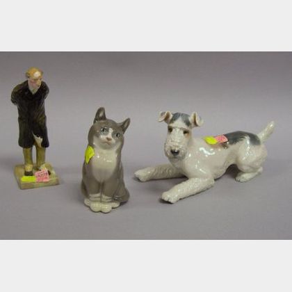 Royal Heidelberg Porcelain Terrier, Royal Copenhagen Porcelain Cat, and a Crown Staffordshire Porcelain Pecksniff Figural. 