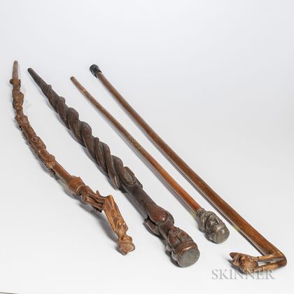 Four Carved and Decorated Canes