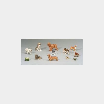 Twelve Small Canine Figurines and Boxes