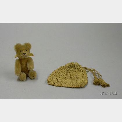Small Schuco Mohair Articulated Teddy Bear and a Childs Crocheted Purse. 