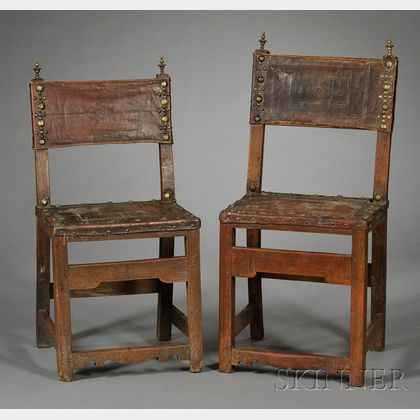 Two Spanish Baroque Walnut, Tooled Leather and Brass-mounted Side Chairs