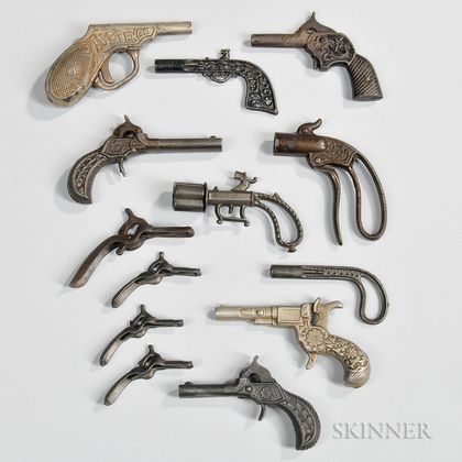 Thirteen Small Cast Iron Toy Cap Guns