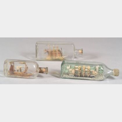 Three Carved Wooden Ships in Bottles