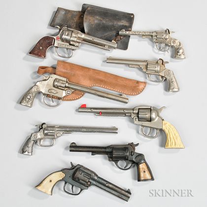 Eight Cast Iron Toy Cap Guns and Two Holsters