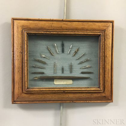 Two Groups of Framed Items in Shadow Boxes