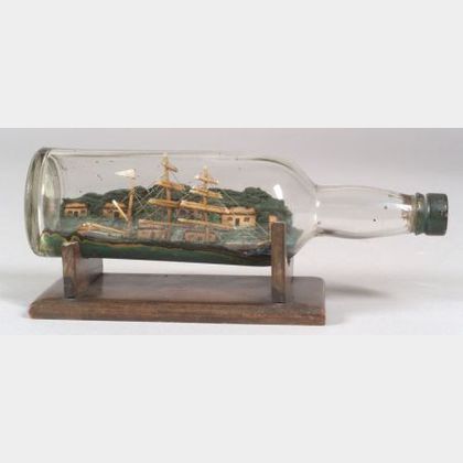 Carved Wooden Ship in a Bottle
