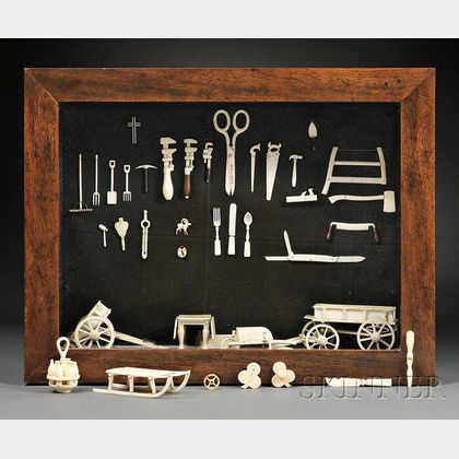 Shadow Box Mounted with Miniature Carved Bone Tools and Household Implements